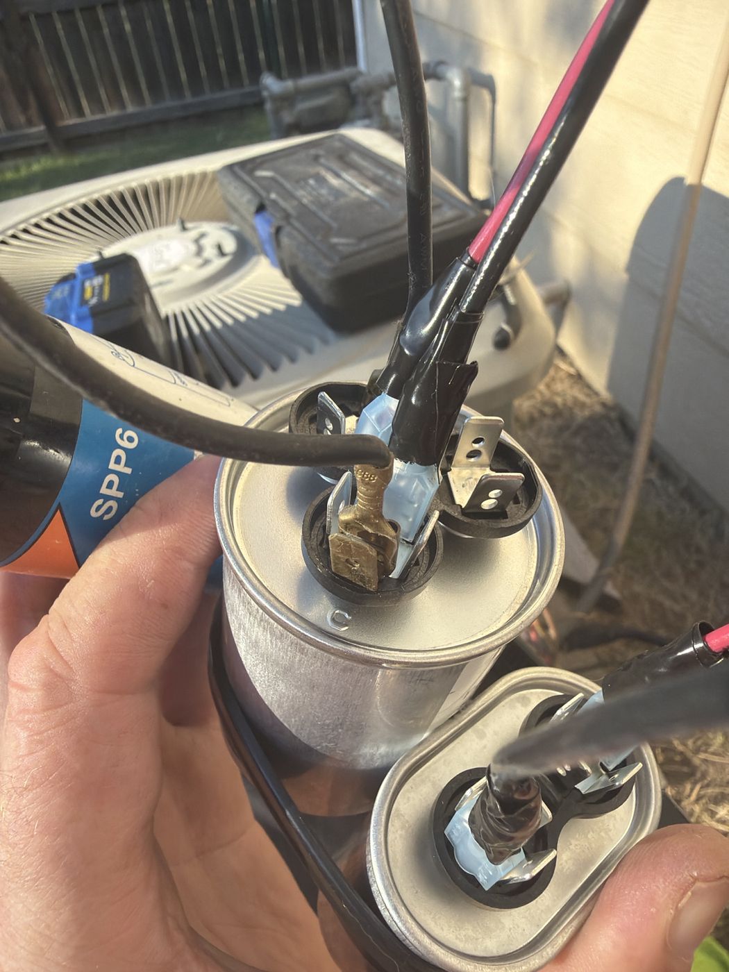 The small 10 MFD capacitor jumpered with one leg on HERM and the other on C